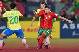 أسود الأطلس يفتتحون مشوارهم بتعادل إيجابي أمام المنتخب البرازيلي. 2 telechargement 34