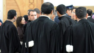 جريدة القرب 170 Lawyers are pictured at court in Casablanca on January 28, 2011 after the court postponed the verdict to February 11, 2011, in the trial of seven Sahrawi militants. The militants were arrested in October of 2009 at the airport in Casablanca on their return from Tindouf, in southern Algeria, where there is a strong pro-independence movement 'le Polisario' for the Western Sahara. The Polisario Front, with the support of Algiers, wants a referendum on self-determination, with independence as one of the options. AFP PHOTO / ABDELHAK SENNA (Photo credit should read ABDELHAK SENNA/AFP/Getty Images)